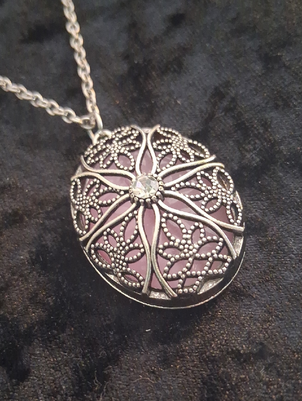 Silver Filigree Oval Pendant Necklace with Pink Pearl Backing. 26 In Long